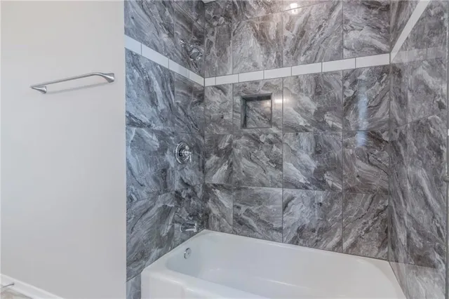 a bathroom with a bathtub