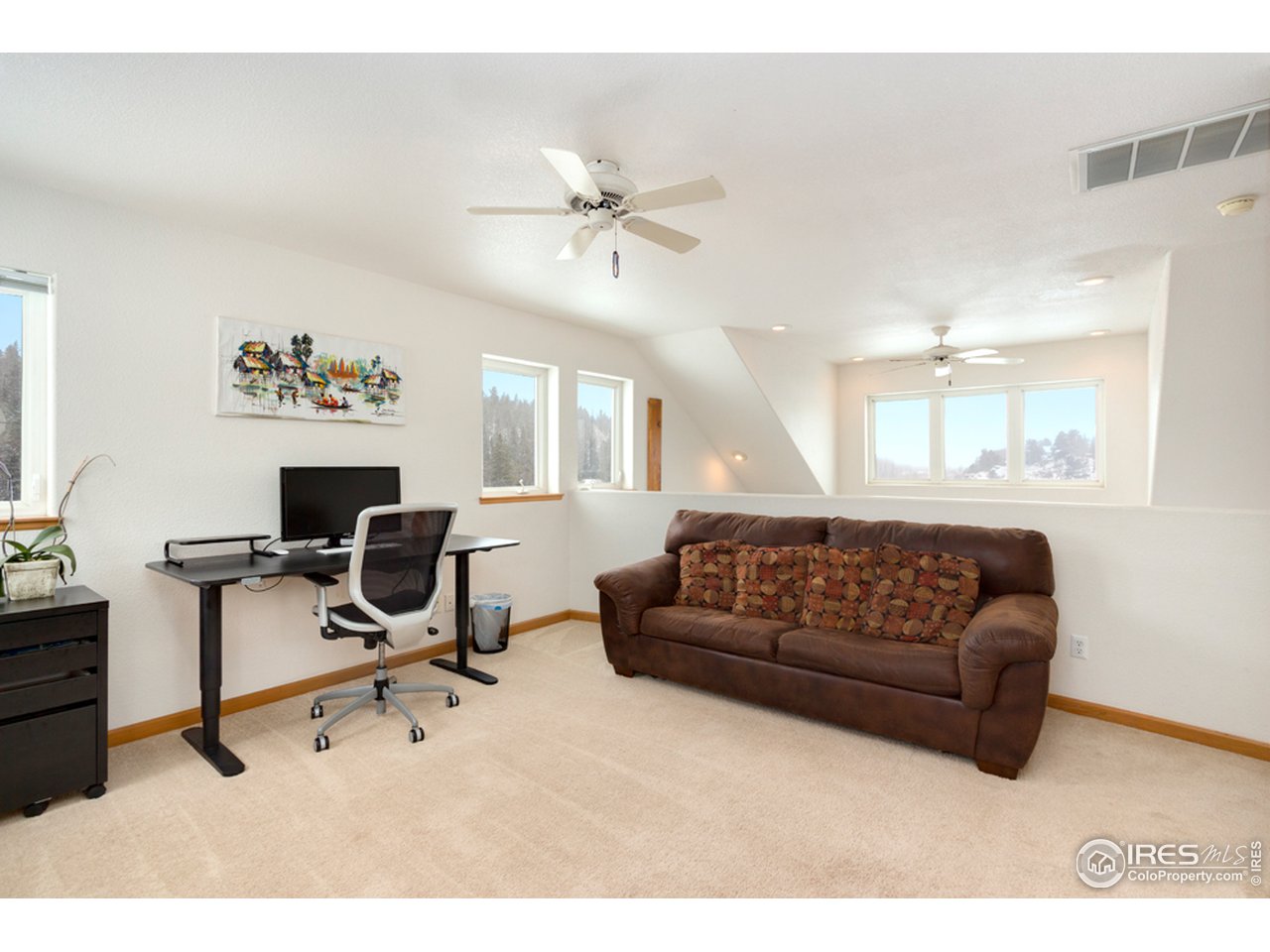 759 Huron Road Red Feather Lakes, CO 80545 - Photo 9 of 21 upper level loft/family room/bedroom