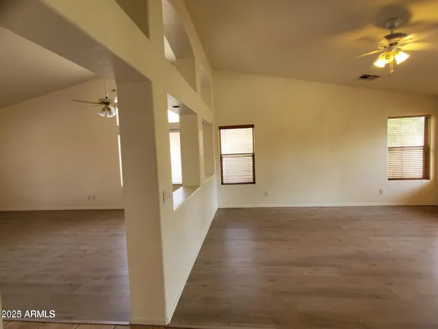 a view of a room that has a window