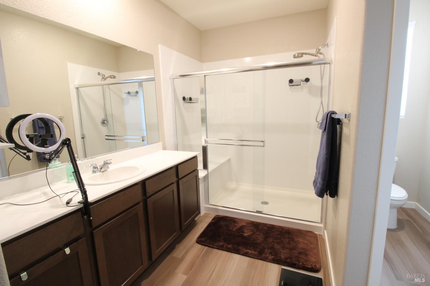2283 Revival Lane Rio Vista, CA 94571 - Photo 13 of 44 a bathroom with a sink mirror toilet and shower
