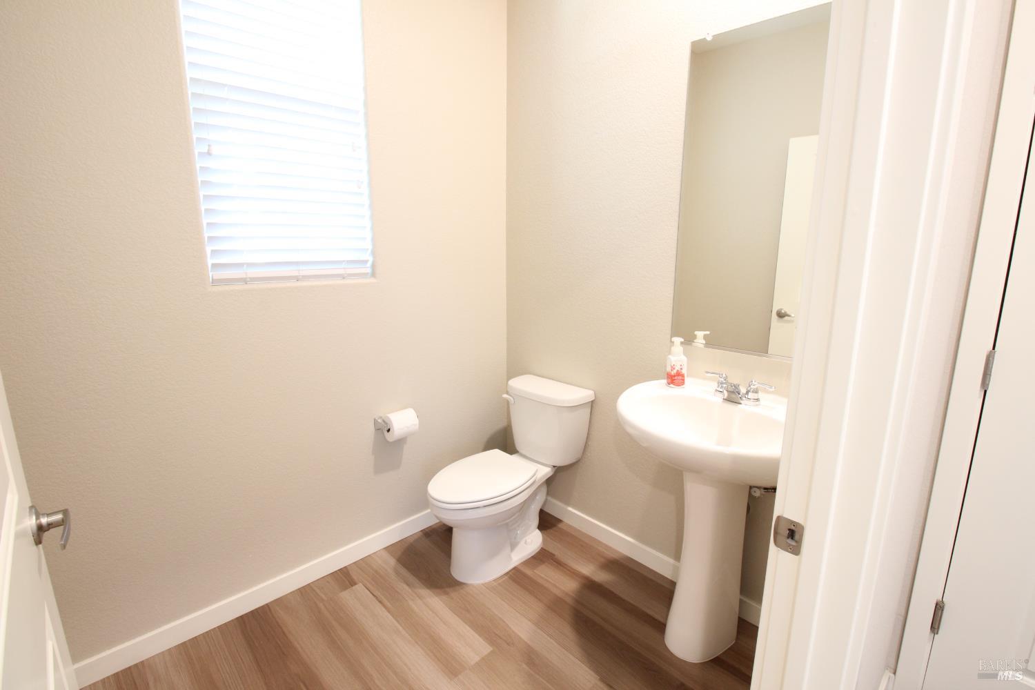 2283 Revival Lane Rio Vista, CA 94571 - Photo 22 of 44 a bathroom with a sink toilet and a mirror