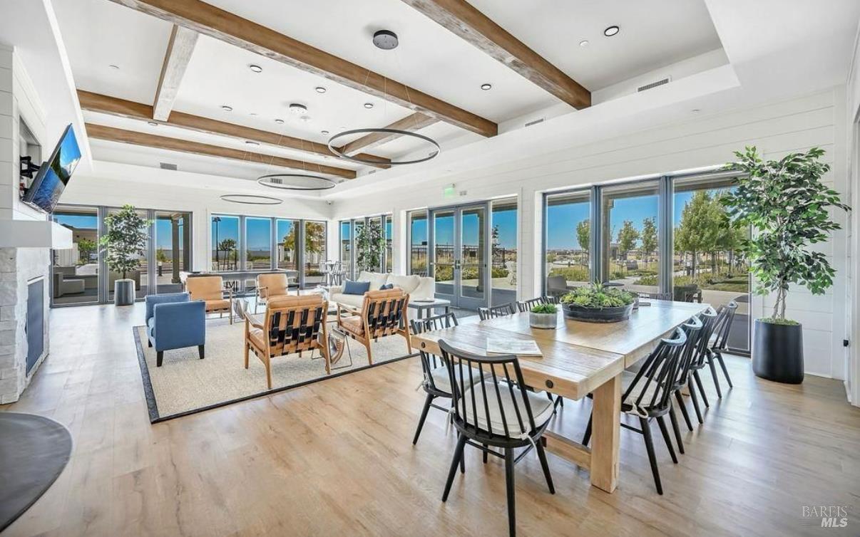 2283 Revival Lane Rio Vista, CA 94571 - Photo 35 of 44 a view of a dining room with furniture window and wooden floor
