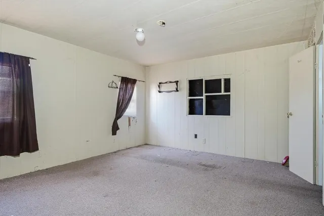 a view of backyard of the house