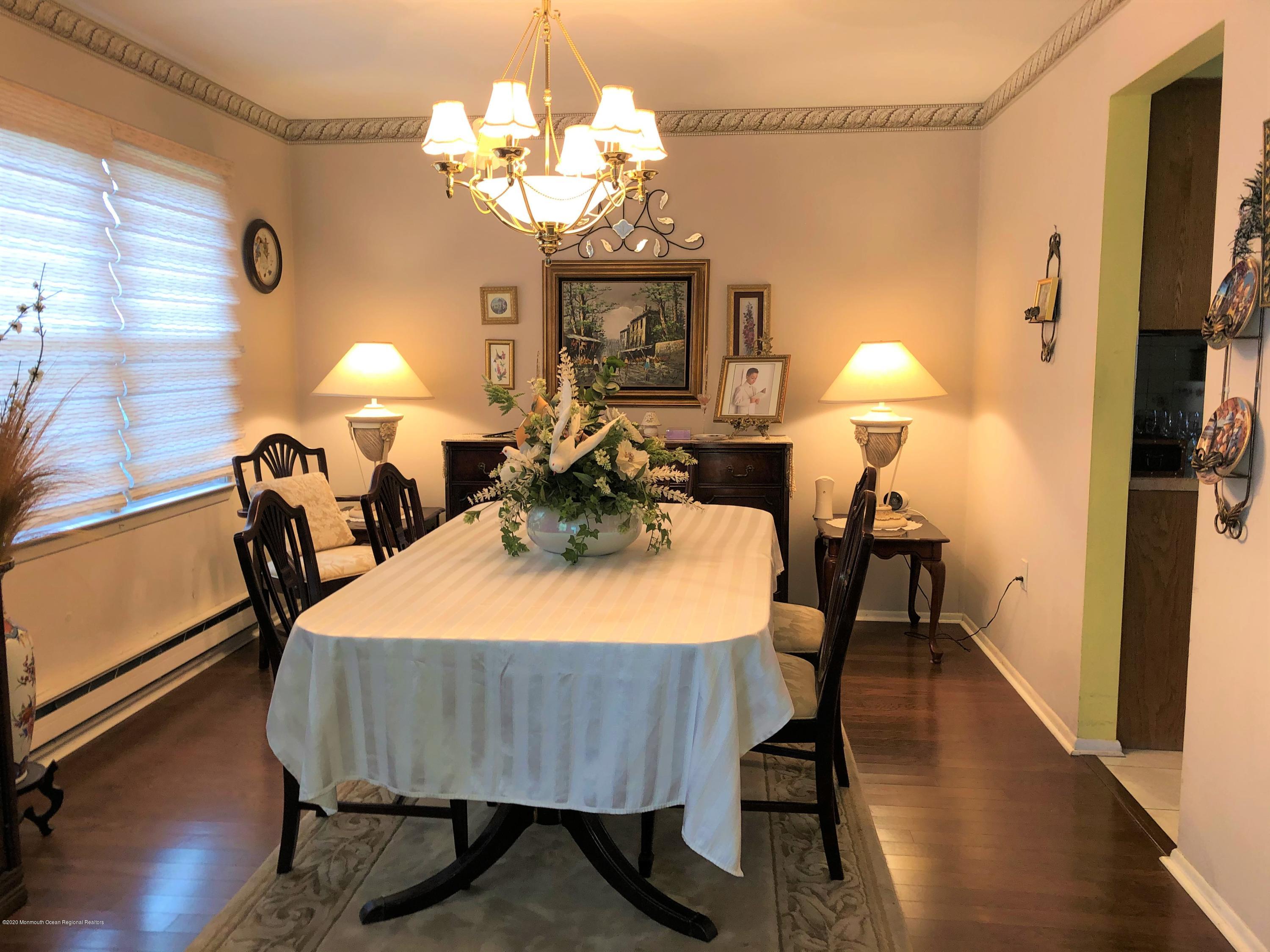 22 Abbey Road Brick, NJ 08723 - Photo 2 of 22 a view of a dining room with furniture and wooden floor