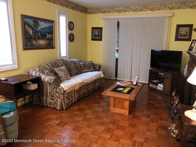 22 Abbey Road Brick, NJ 08723 - Photo 11 of 22 a living room with furniture and a flat screen tv