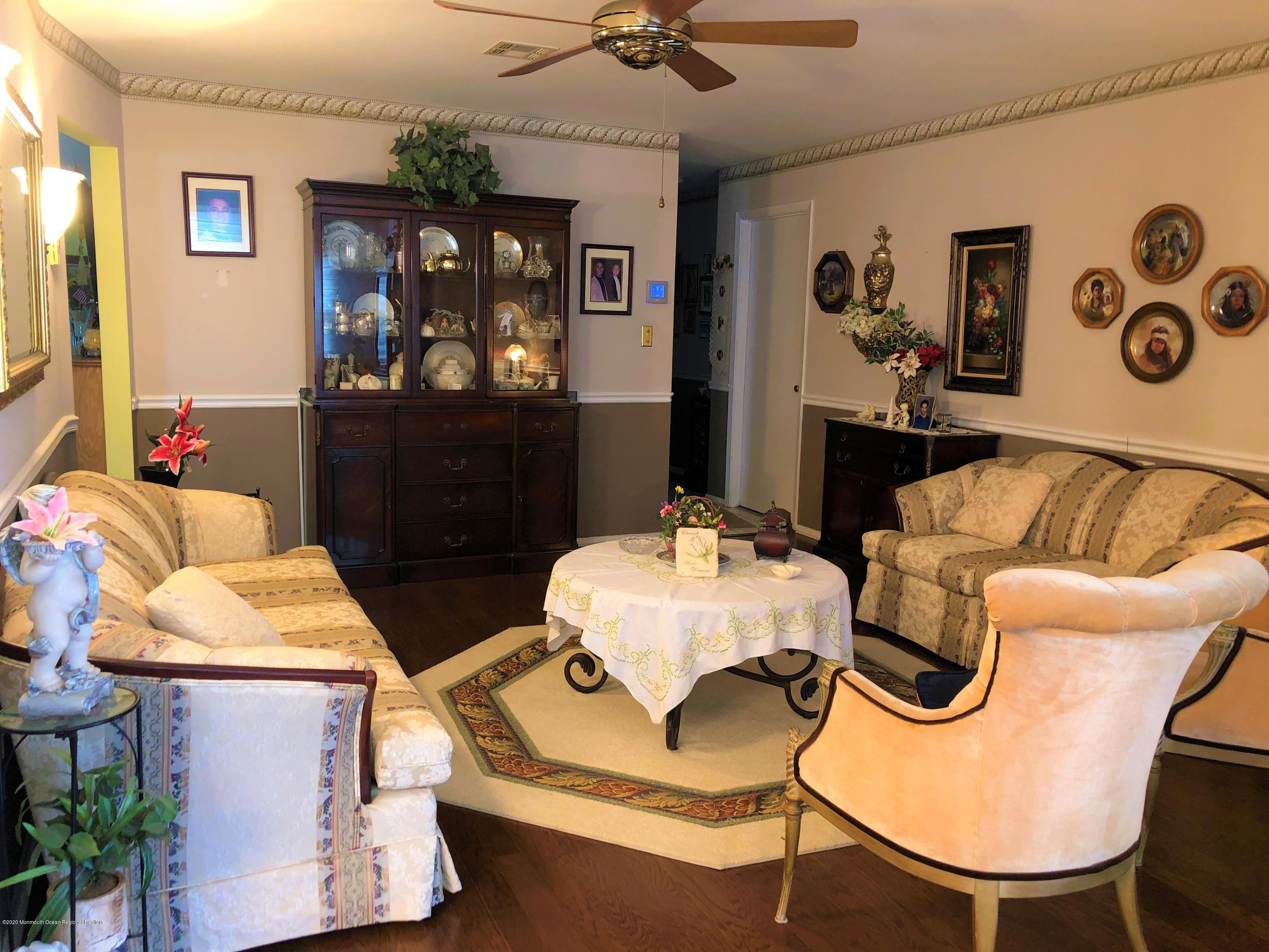 22 Abbey Road Brick, NJ 08723 - Photo 4 of 22 a living room with furniture and window