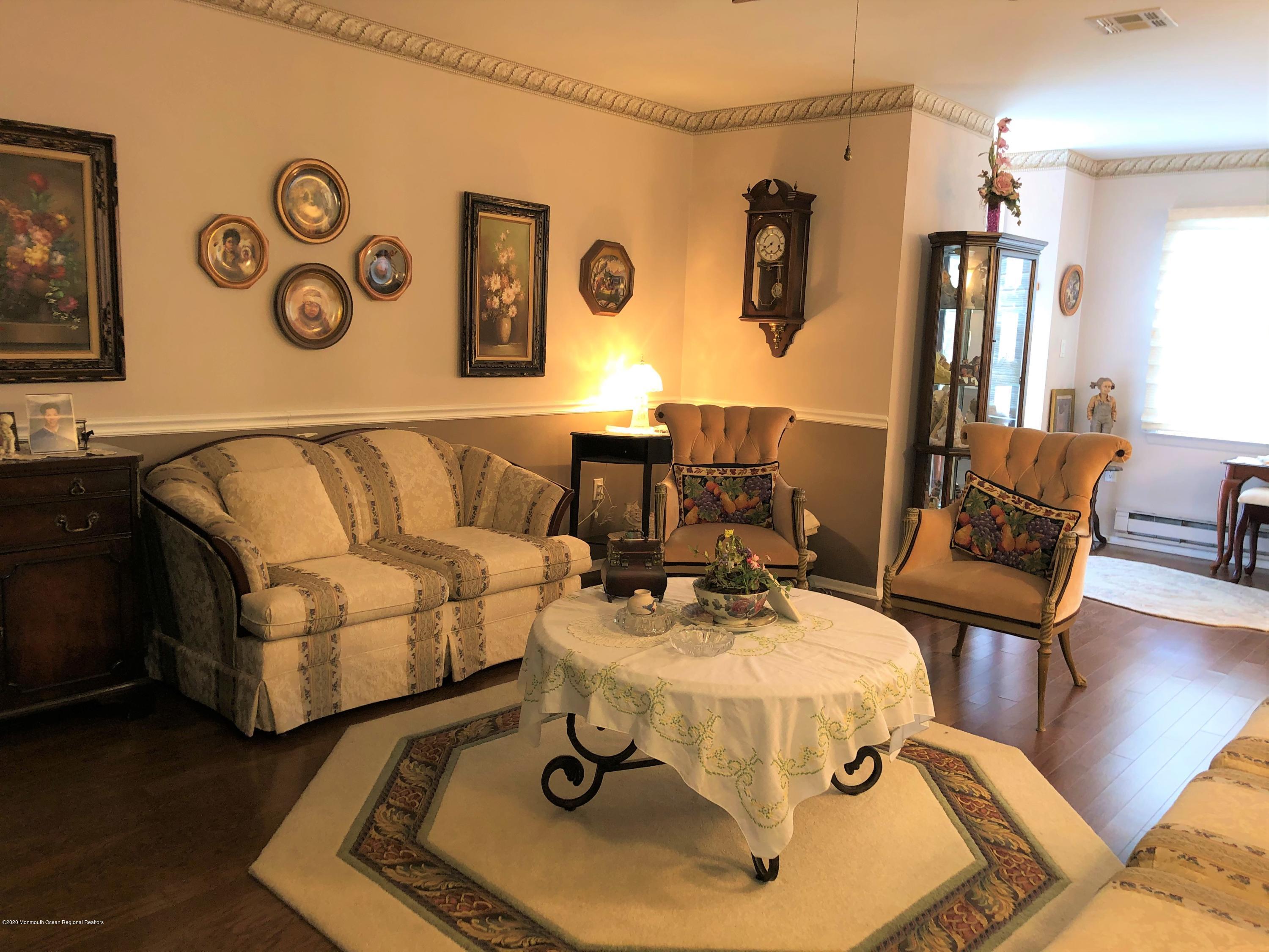 22 Abbey Road Brick, NJ 08723 - Photo 5 of 22 a living room with furniture and wooden floor