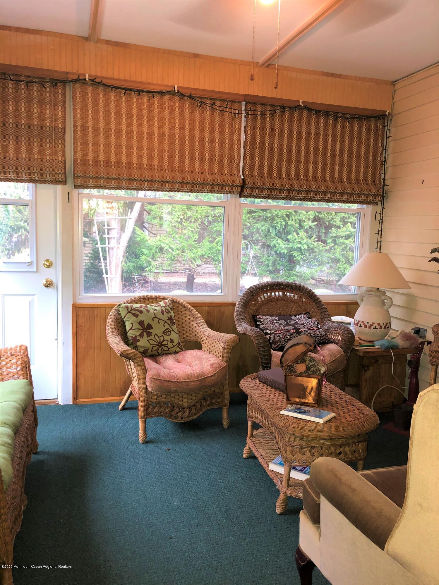 22 Abbey Road Brick, NJ 08723 - Photo 10 of 22 a living room with furniture and a window
