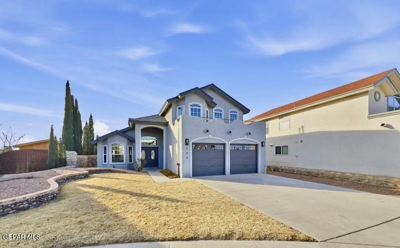533 Flanagan Place El Paso, TX 79928 - Photo 1 of 52 a front view of a house with a yard
