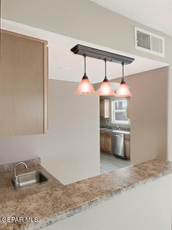 533 Flanagan Place El Paso, TX 79928 - Photo 12 of 52 a bedroom with a bed and a view of kitchen