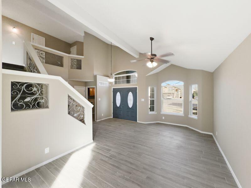 533 Flanagan Place El Paso, TX 79928 - Photo 21 of 52 a view of a hallway with entryway and wooden floor