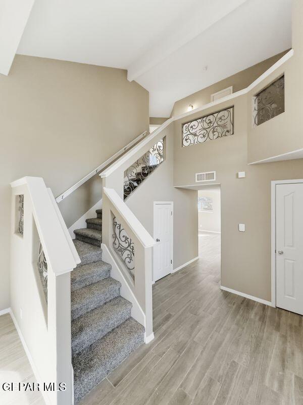 533 Flanagan Place El Paso, TX 79928 - Photo 23 of 52 a view of staircase with white walls and stairs