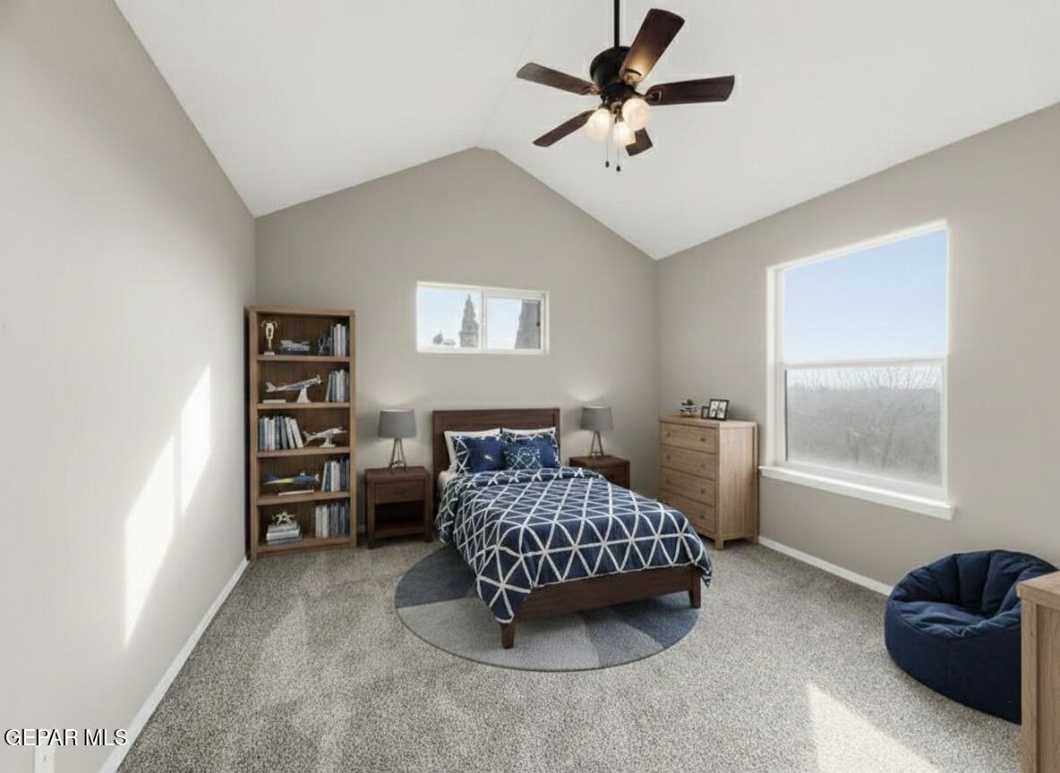 533 Flanagan Place El Paso, TX 79928 - Photo 4 of 52 a bedroom with a bed a couch and a chandelier