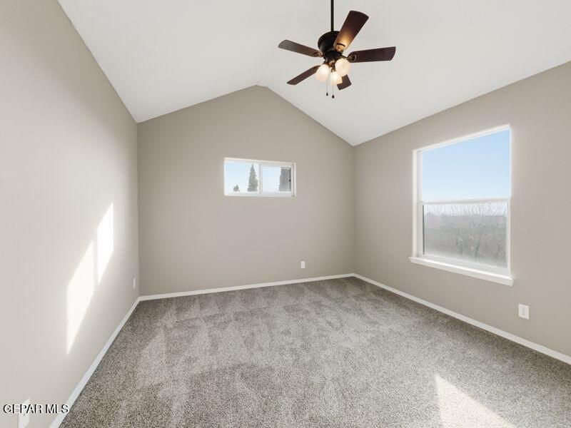 533 Flanagan Place El Paso, TX 79928 - Photo 46 of 52 an empty room with windows and fan