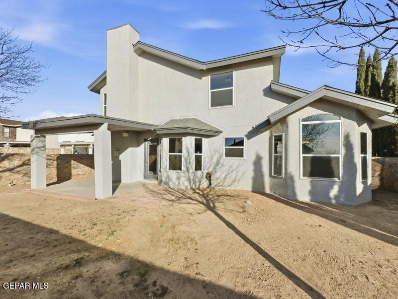 533 Flanagan Place El Paso, TX 79928 - Photo 48 of 52 a view of a house with a snow in the yard