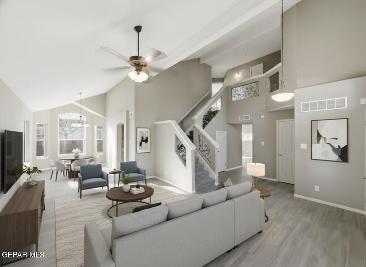 533 Flanagan Place El Paso, TX 79928 - Photo 7 of 52 a living room with furniture and a chandelier