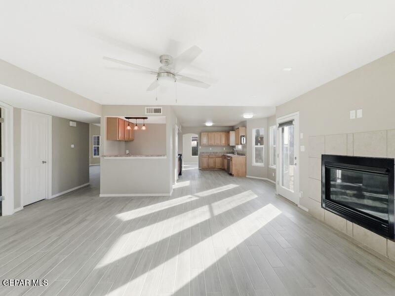 533 Flanagan Place El Paso, TX 79928 - Photo 10 of 52 a view of kitchen and hall with wooden floor