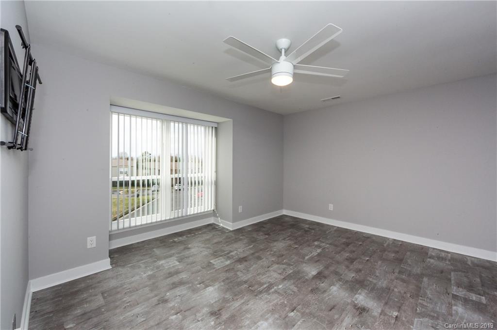 11077 Running Ridge Road Charlotte, NC 28226 - Photo 14 of 21 a view of an empty room with a window