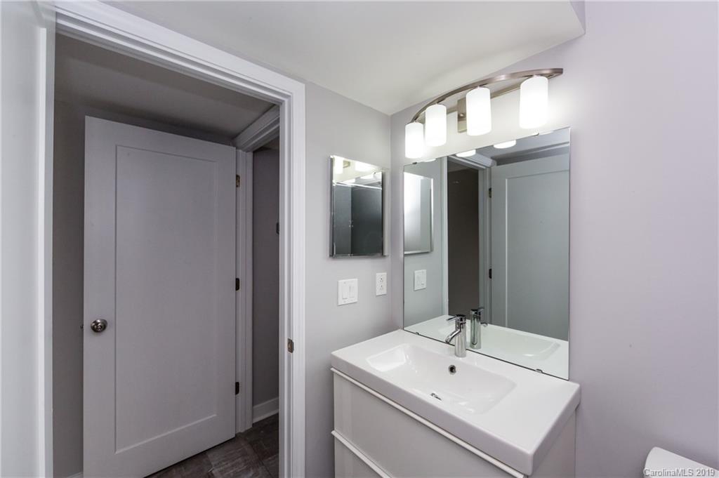 11077 Running Ridge Road Charlotte, NC 28226 - Photo 17 of 21 a bathroom with a sink and a mirror