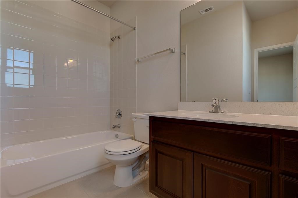 6907 Idea Road Austin, TX 78741 - Photo 18 of 29 2nd level full bath in one of the bedroom