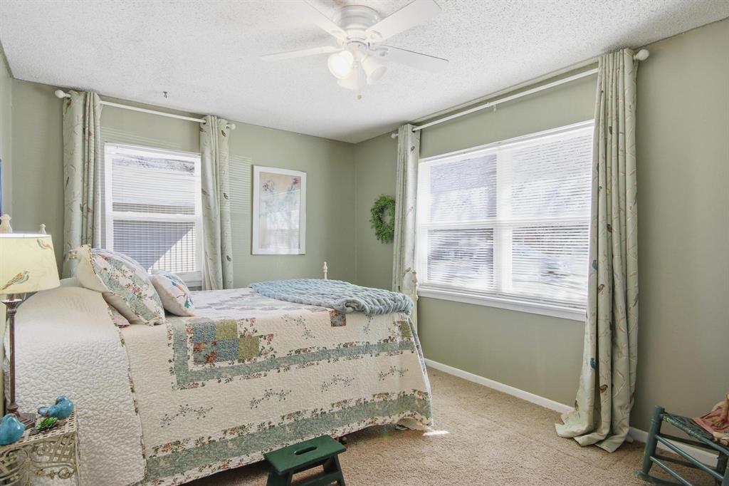 126 4th Street Tuscola, TX 79562 - Photo 24 of 31 a bedroom with a bed and a window