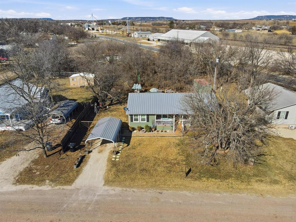 126 4th Street Tuscola, TX 79562 - Photo 3 of 31 an aerial view of houses with yard