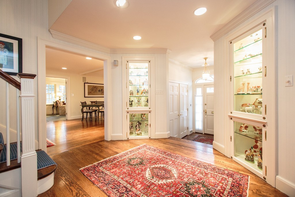 65 Arnold Road Wellesley, MA 02481 - Photo 3 of 17 a living room with furniture and a table