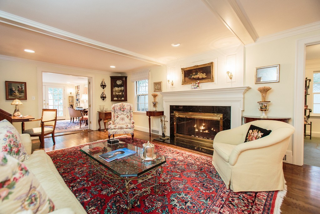 65 Arnold Road Wellesley, MA 02481 - Photo 5 of 17 a living room with furniture and a fireplace