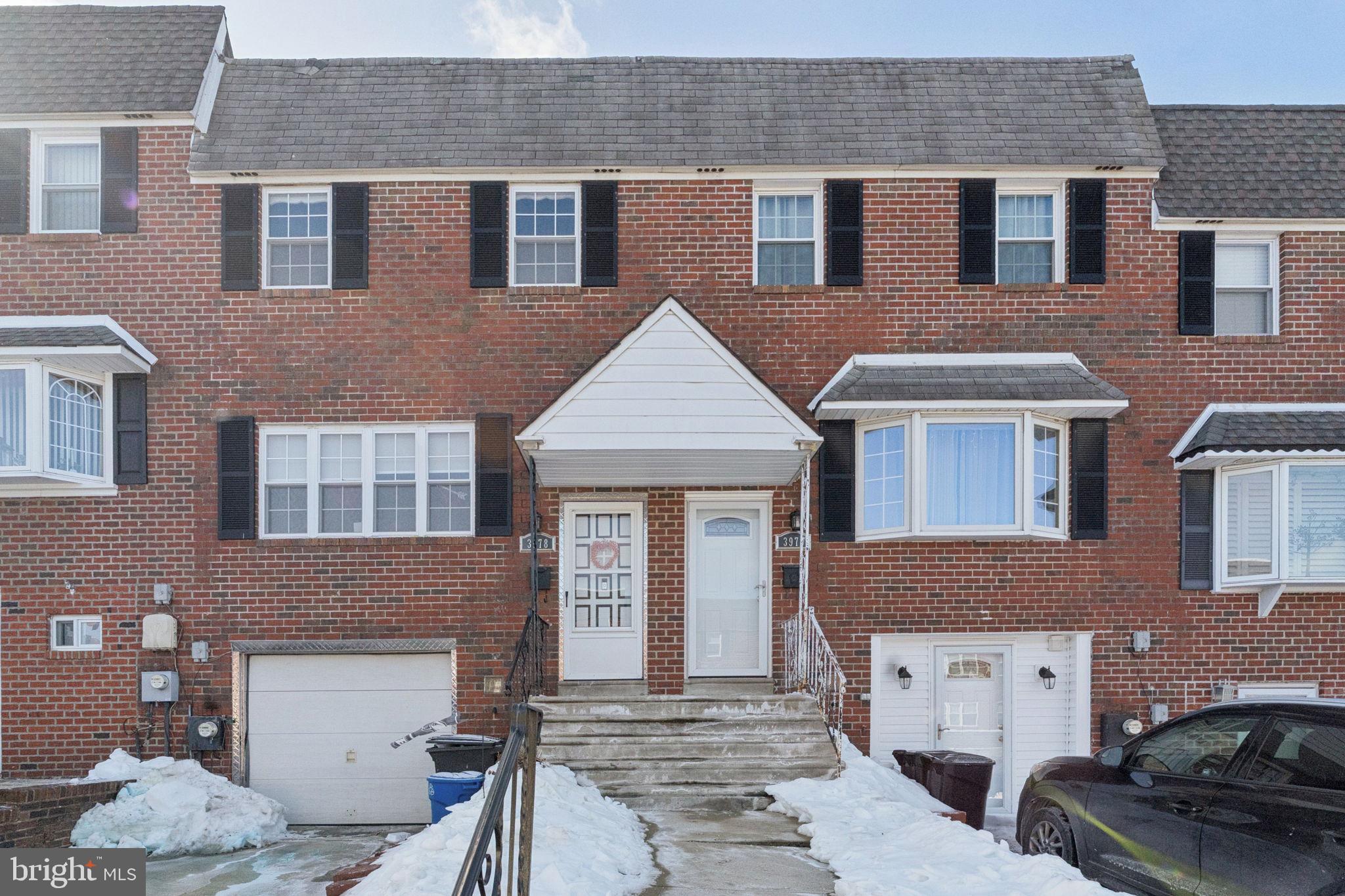 3978 Stevenson Street Philadelphia, PA 19114 - Photo 1 of 25 a front view of a house with a yard