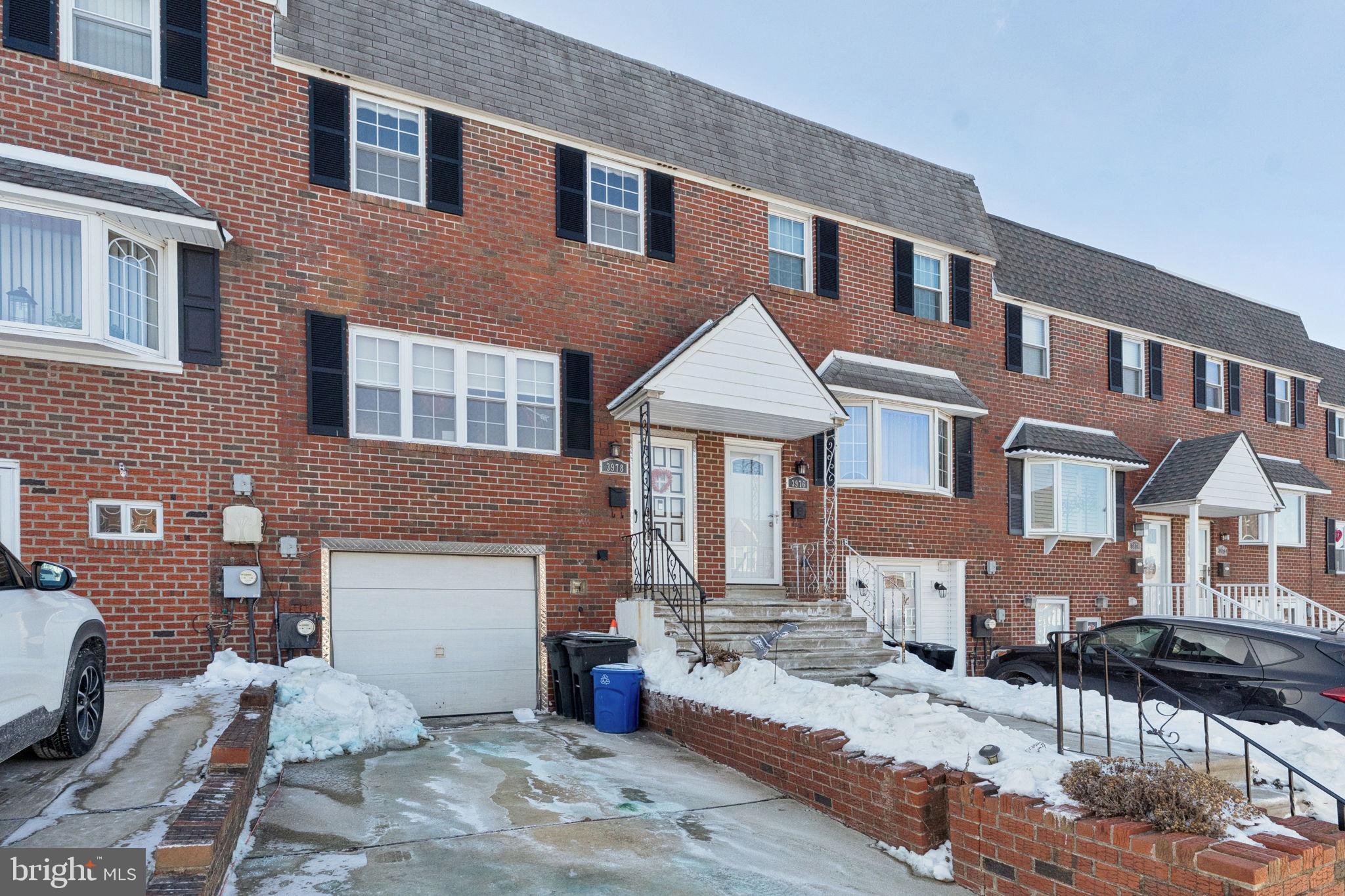 3978 Stevenson Street Philadelphia, PA 19114 - Photo 2 of 25 a front view of a house with a yard
