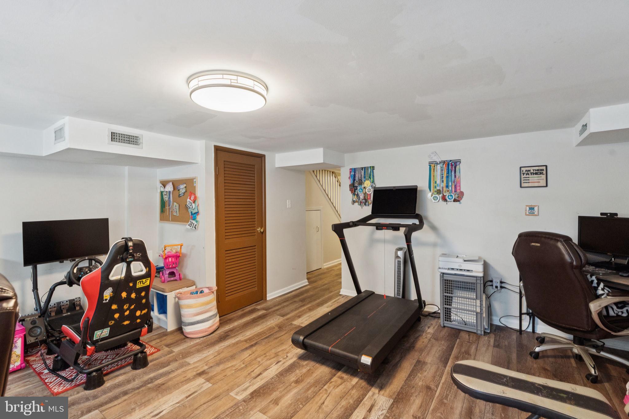 3978 Stevenson Street Philadelphia, PA 19114 - Photo 24 of 25 a view of a room with gym equipment