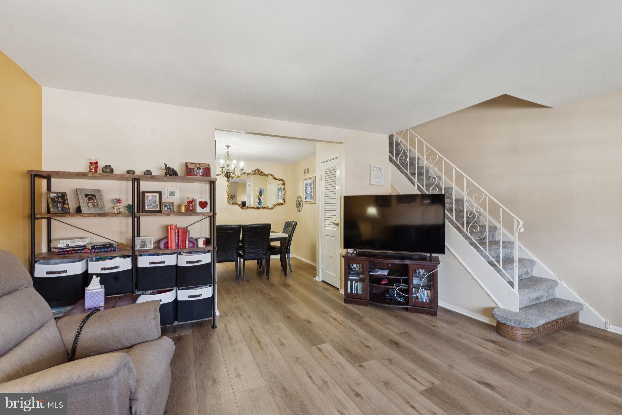 3978 Stevenson Street Philadelphia, PA 19114 - Photo 4 of 25 a living room with furniture and a flat screen tv