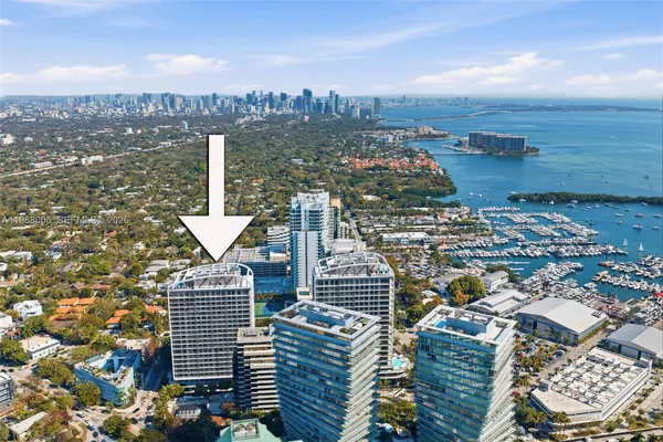 a view of a big building and a big yard