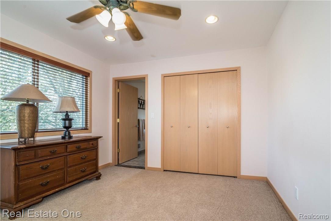 8519 Tindall Road Davisburg, MI 48350 - Photo 33 of 41 Plenty of closet space and an adjoining bathroom.