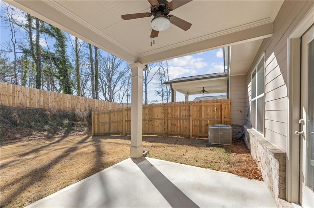 5629 Overview Drive Flowery Branch, GA 30542 - Photo 22 of 25 a view of a porch with a backyard
