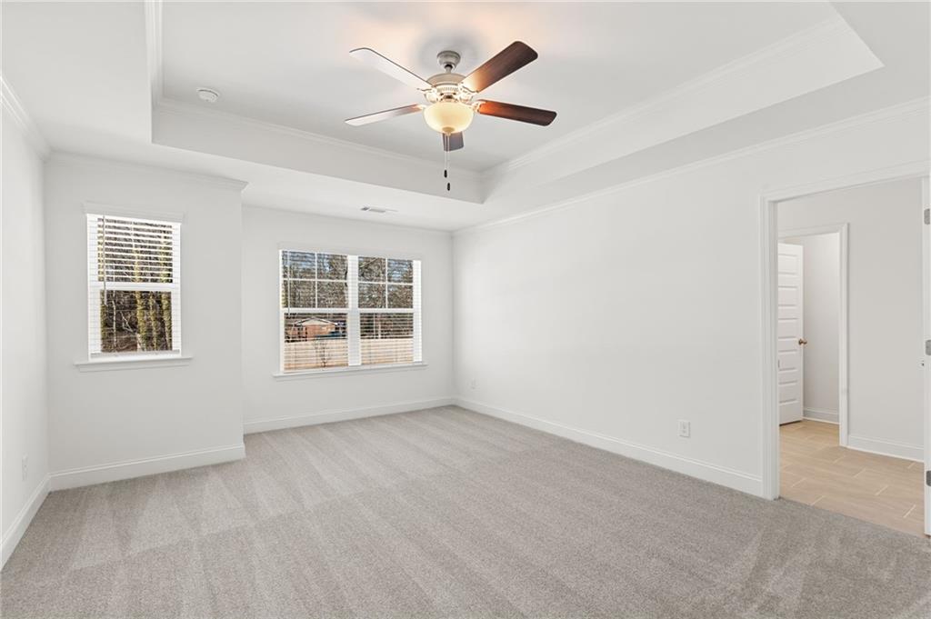 5629 Overview Drive Flowery Branch, GA 30542 - Photo 9 of 25 a view of an empty room with a window