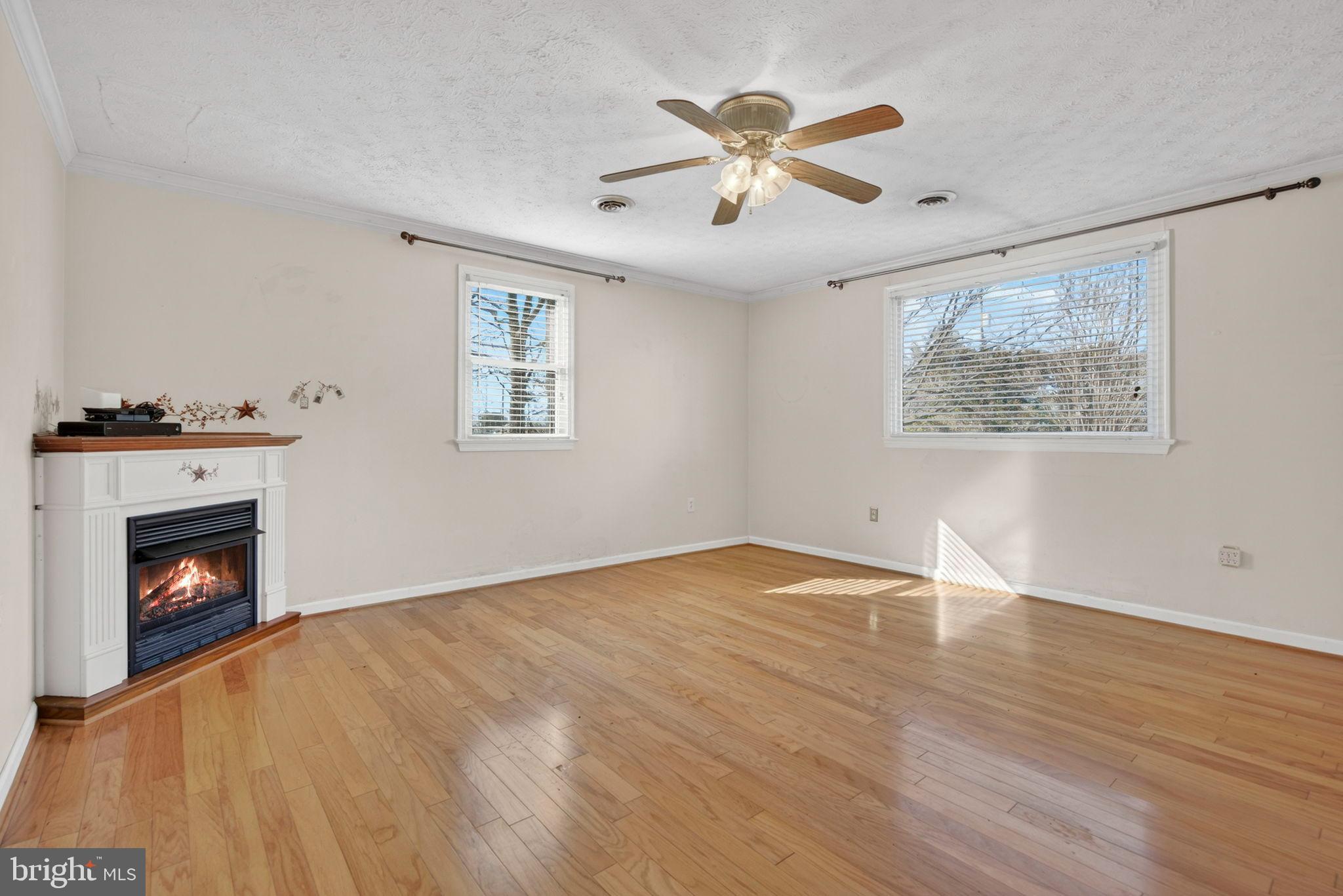 7243 Covingtons Corner Road Bealeton, VA 22712 - Photo 17 of 41 Cozy Living Room w/corner gas fireplace
