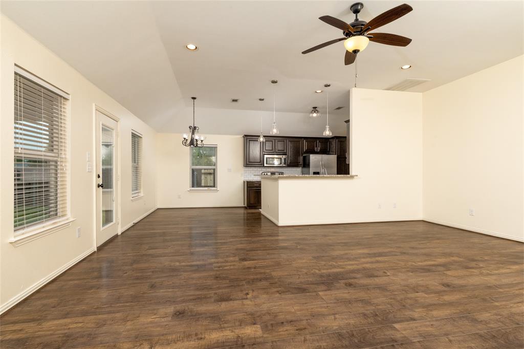 405 Kimbrough Road Azle, TX 76020 - Photo 5 of 39 a view of a kitchen with a sink and a window