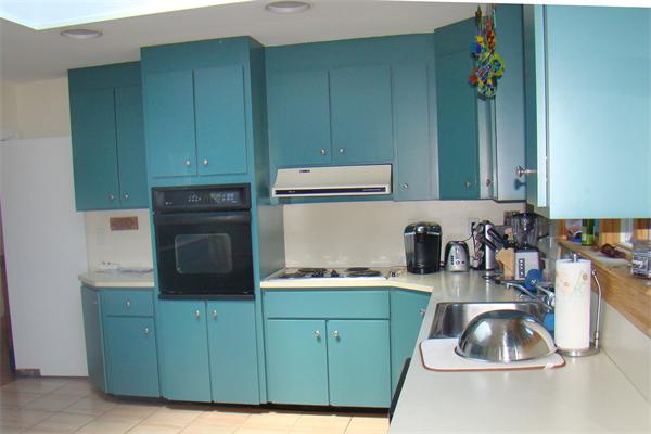 100 Deborah Road Newton, MA 02459 - Photo 3 of 5 a kitchen with cabinets a washer and dryer