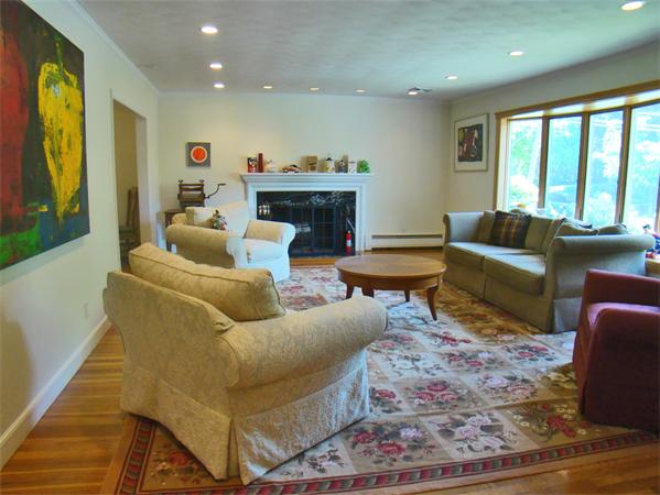 100 Deborah Road Newton, MA 02459 - Photo 5 of 5 a living room with furniture and a fireplace