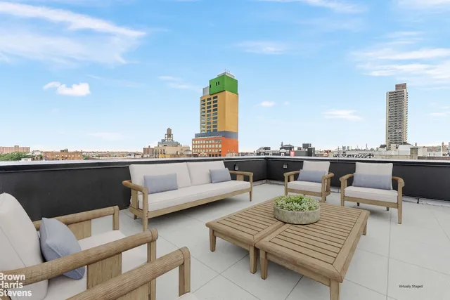 a view of outdoor space with seating area