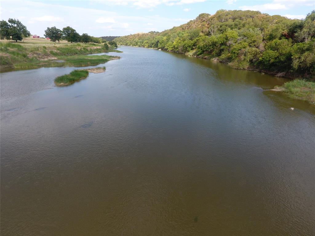 Tbd Big Bnd Road Mineral Wells, TX 76067 - Photo 13 of 17 a view of a lake with houses in the back