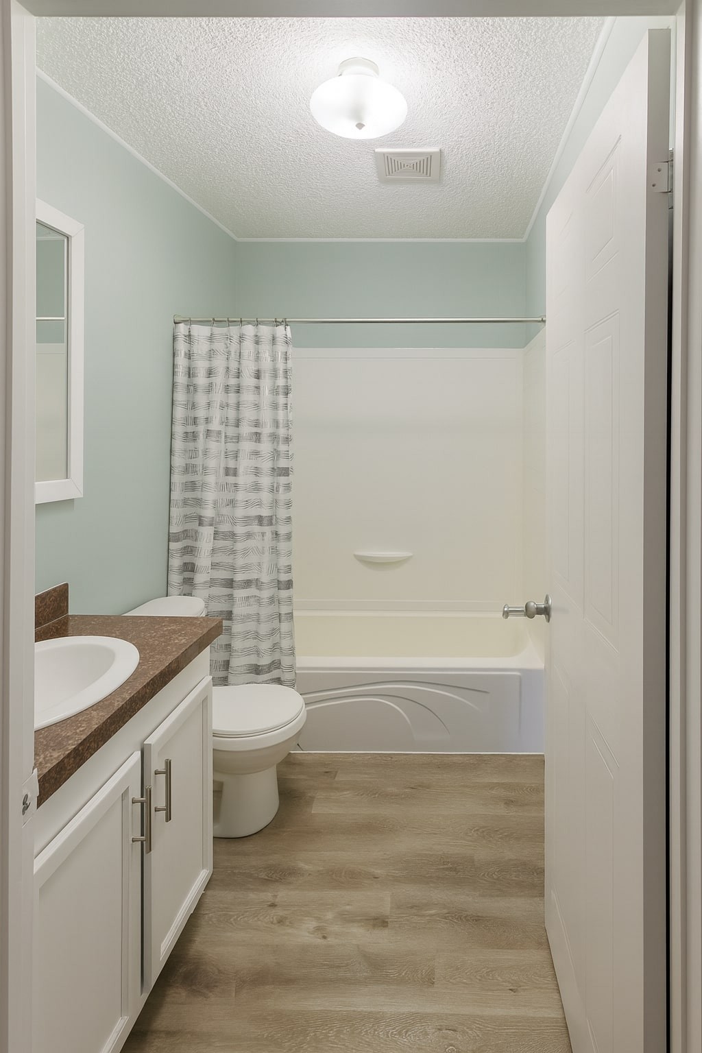 339 Old Flatwoods School Road Linden, TN 37096 - Photo 13 of 21 a bathroom with a granite countertop sink toilet and shower