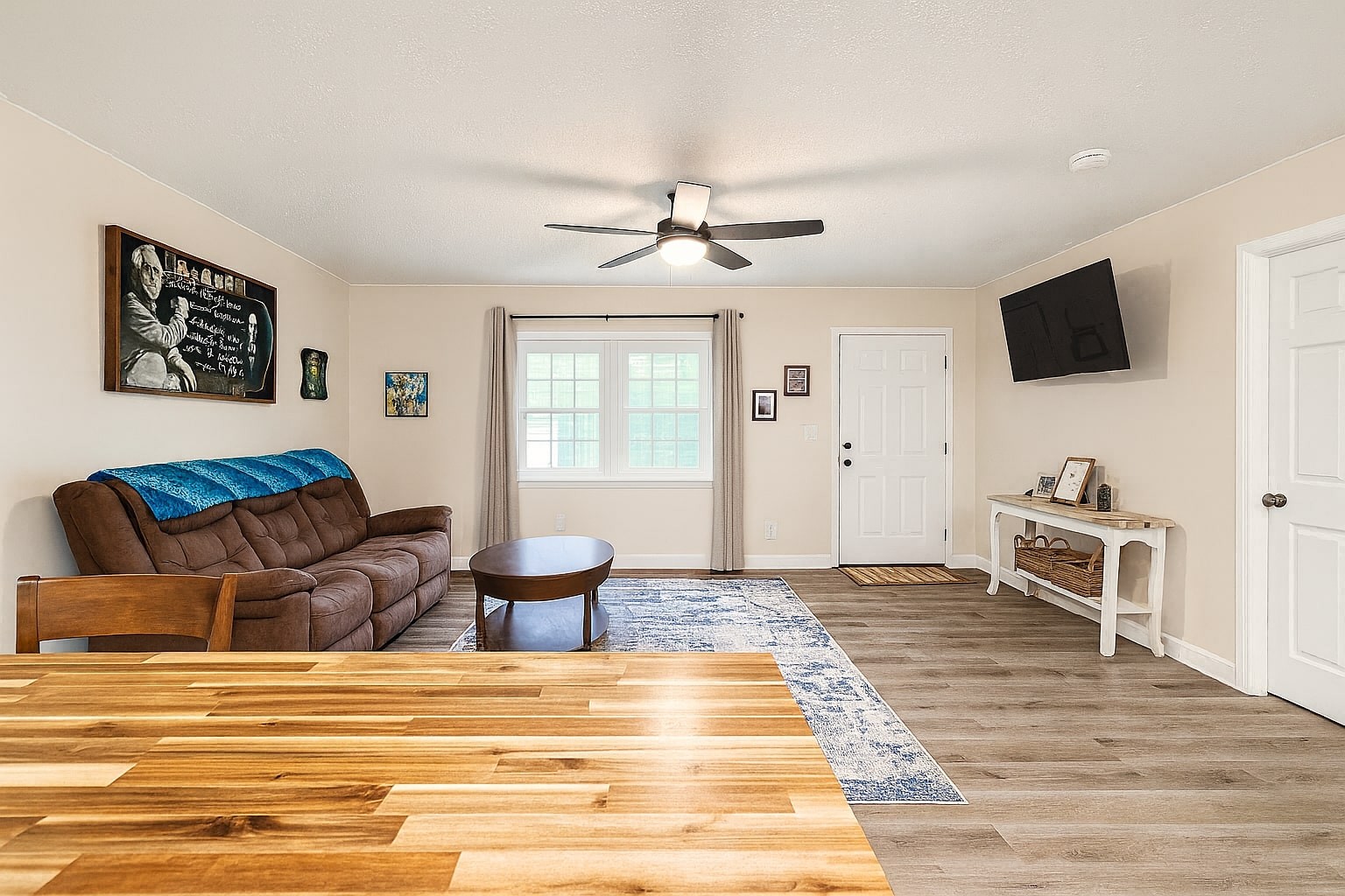 339 Old Flatwoods School Road Linden, TN 37096 - Photo 9 of 21 a living room with furniture and a flat screen tv