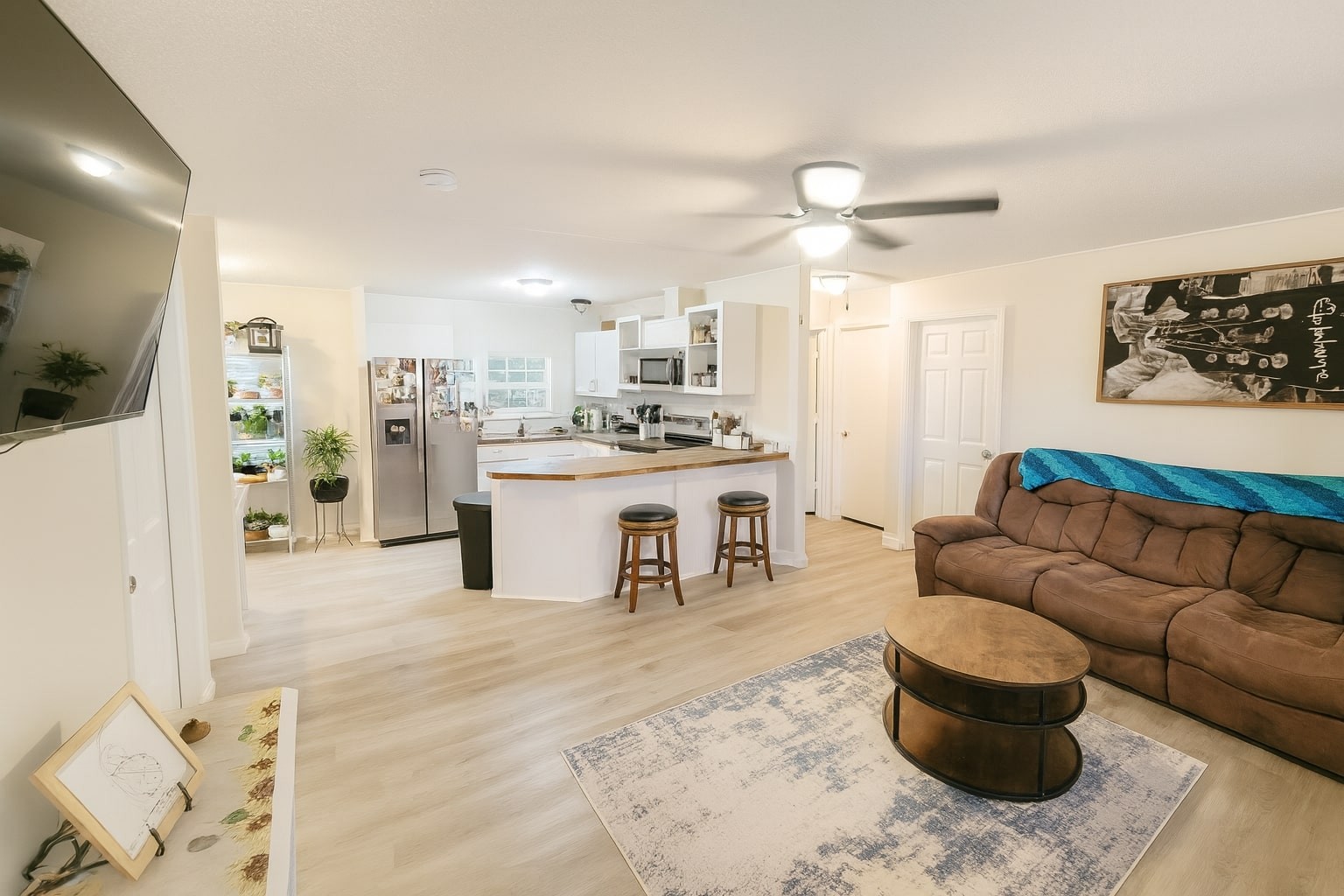 339 Old Flatwoods School Road Linden, TN 37096 - Photo 10 of 21 a living room with furniture and a kitchen