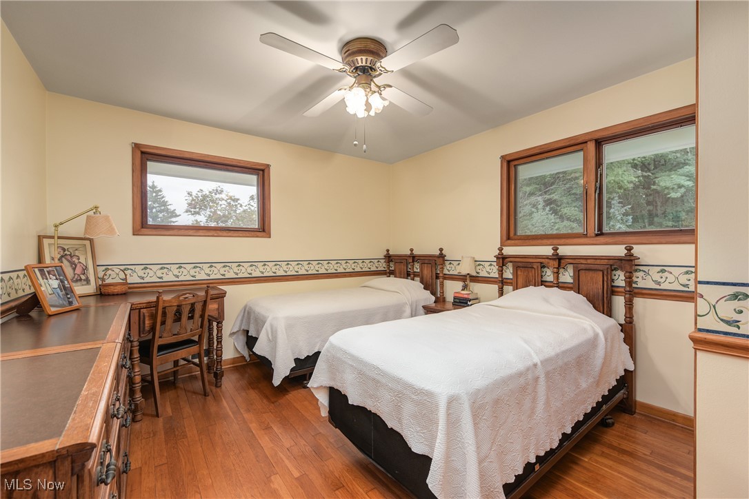 4712 Hillside Road Independence, OH 44131 - Photo 18 of 47 Bedroom with wood finished floors and a ceiling fan
