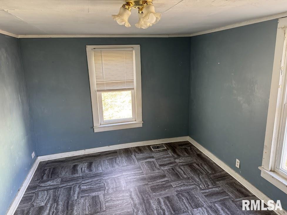205 North State Street Christopher, IL 62822 - Photo 11 of 15 a view of a room with wooden floor and a window