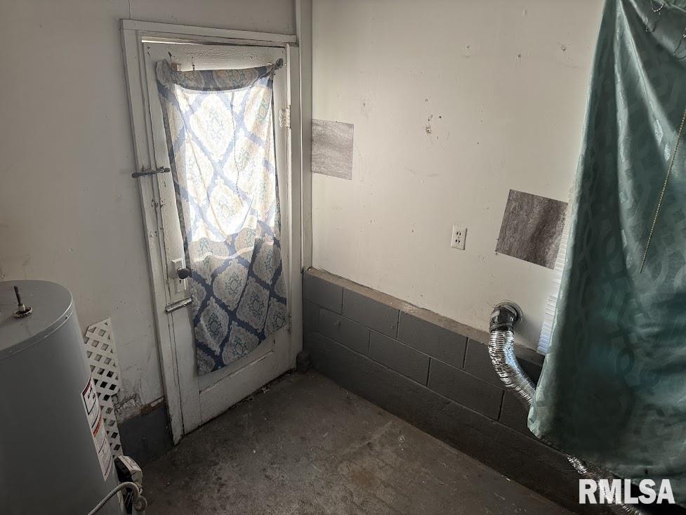 205 North State Street Christopher, IL 62822 - Photo 13 of 15 a close view of water heater room