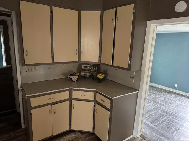 a kitchen with stainless steel appliances a sink and a refrigerator