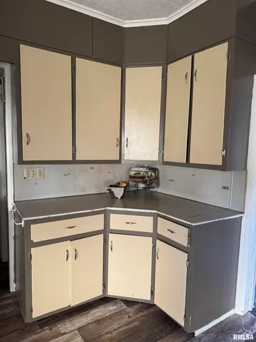 a kitchen with stainless steel appliances granite countertop a sink and a cabinets